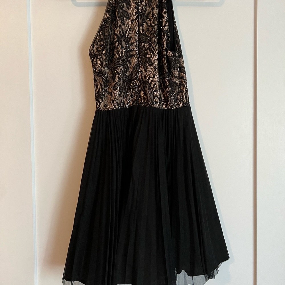 Lace, beaded, sequined, halter top dress with a tule skirt